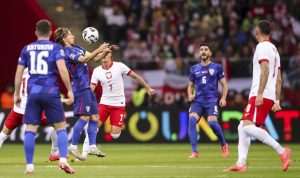 Luka Modrić u utakmici Poljska - Hrvatska / Foto: Hina